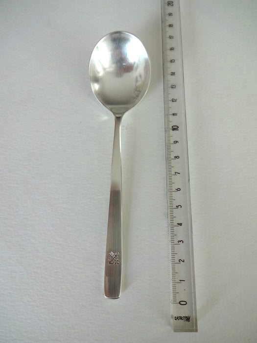 Spoon with key and anchor on handle