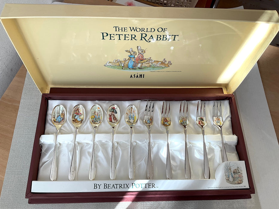 Set of 10 stainless steel spoons + forks with Peter Rabbit illustrations on the mouthpart