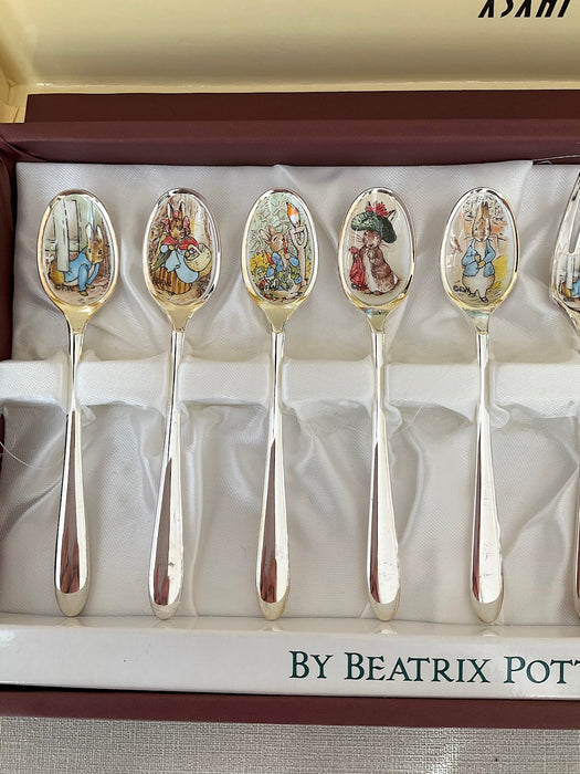 Set of 10 stainless steel spoons + forks with Peter Rabbit illustrations on the mouthpart