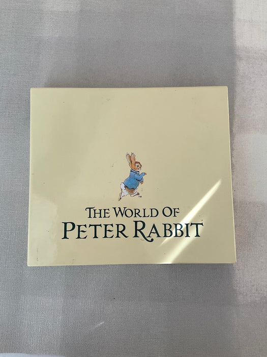 Set of 5 stainless steel gold spoons with Peter Rabbit illustrations on the mouthpart