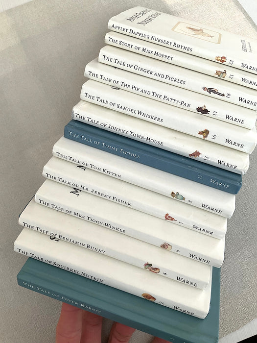 Set of 5 stainless steel gold spoons with Peter Rabbit illustrations on the handles