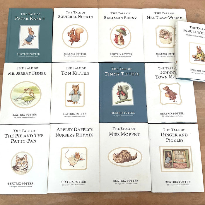 Set of 5 stainless steel gold spoons with Peter Rabbit illustrations on the mouthpart