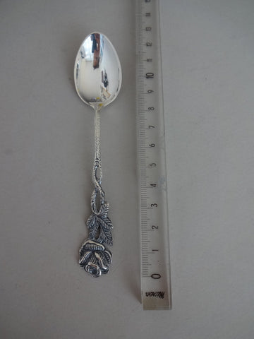 .Spoon with rose on handle