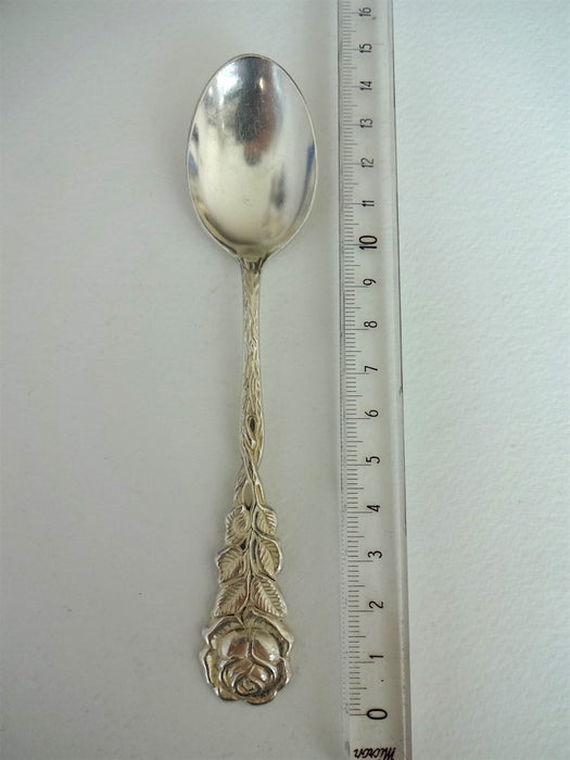 Spoon with rose on handle