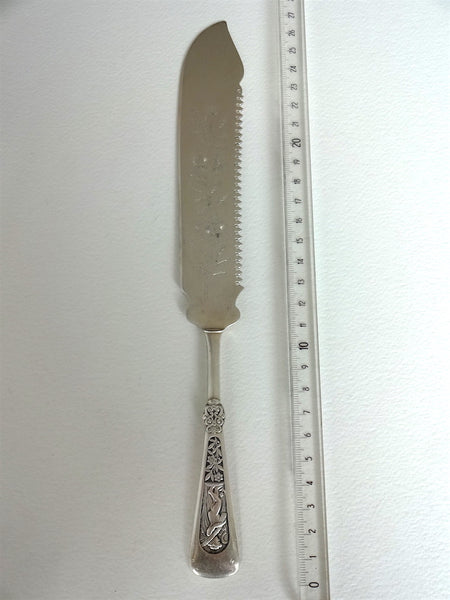 Cake knife (big and very decorated, perfect for a wedding cake!)