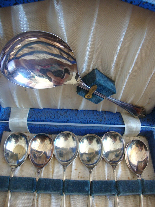 Ice cream serving set: one large serving spoon and 6 spoons  in original box