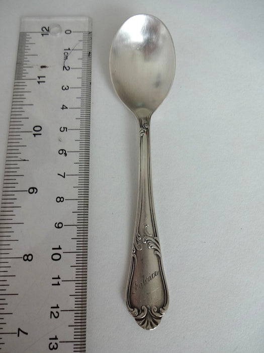 Baby spoon with "Fabrice" on handle