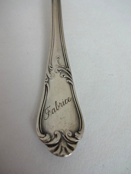 Baby spoon with "Fabrice" on handle