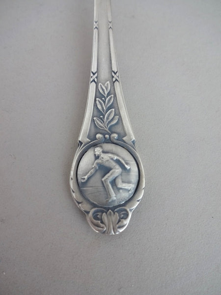 .Teaspoon with man playing pétanque on handle
