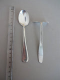.Baby spoon with "food pusher"