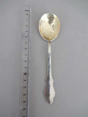 .Sterling silver spoon with gold plated top