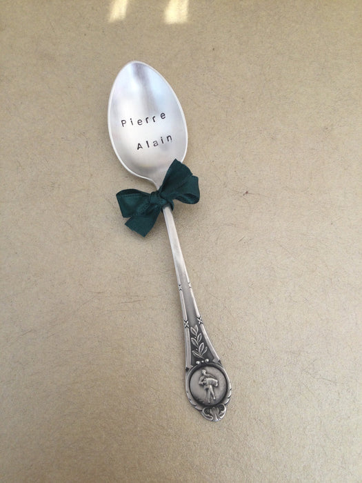 Spoon with accordeonist on handle
